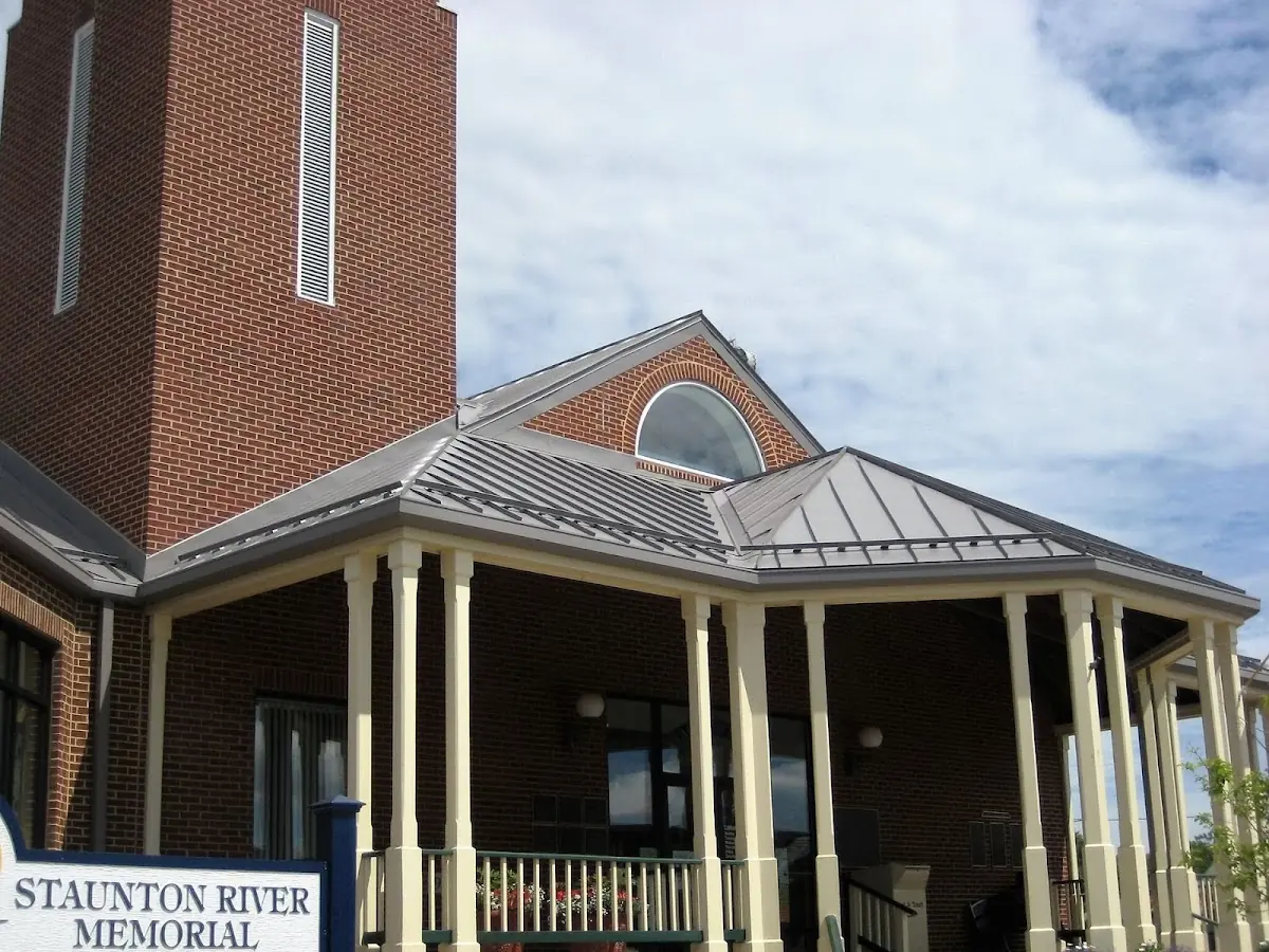 Skilled roofing craftsmen working on a residential roof in Trimble Fields